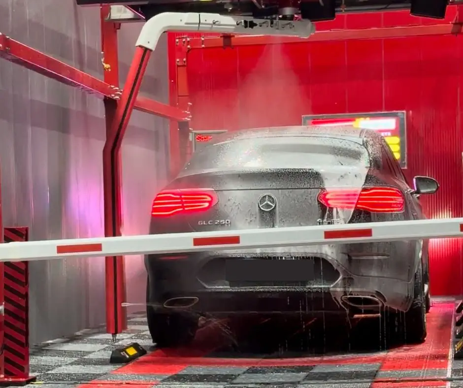 Driveline's automated touchless system washing an SUV to a showroom finish